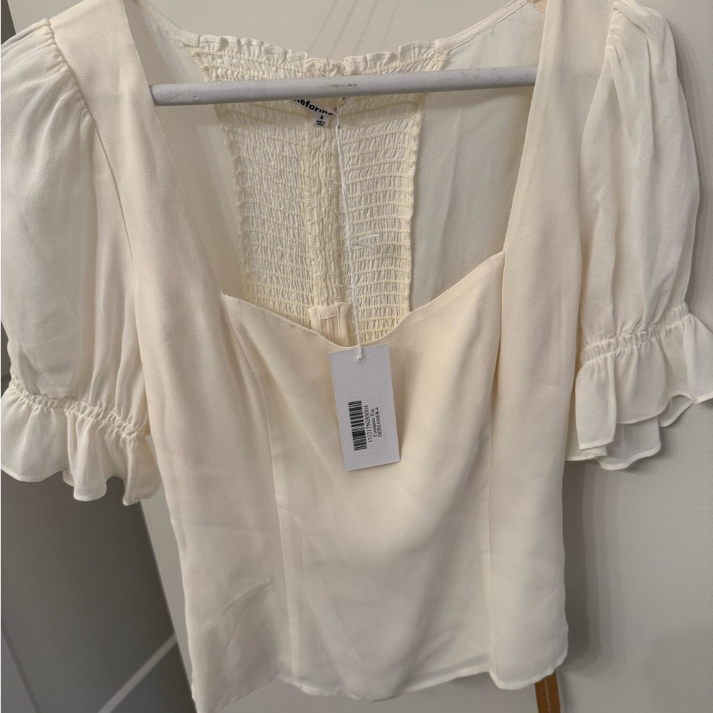 reformation Cream Smocked Ruffle Blouse